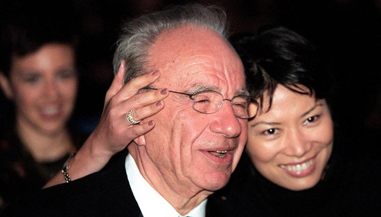 File photo of Rupert Murdoch, chairman and CEO of News Corporation, and his wife Wendi Deng. [Youth.cn]